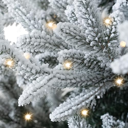 Ginebra 6.5ft Snow Flocked Christmas Tree Prelit with 2456 Branch Tips